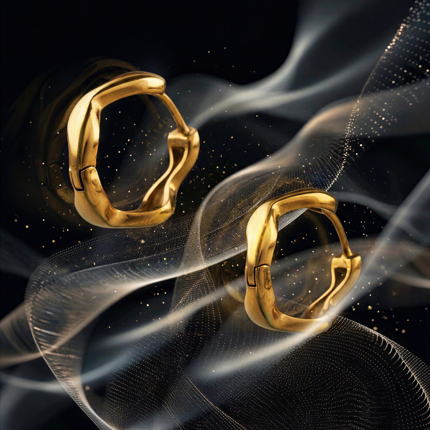 Flux sculptural wavy gold huggie earrings
