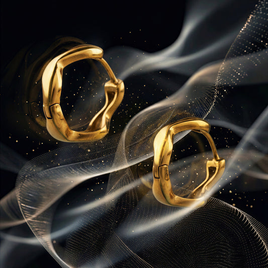 Flux sculptural wavy gold huggie earrings